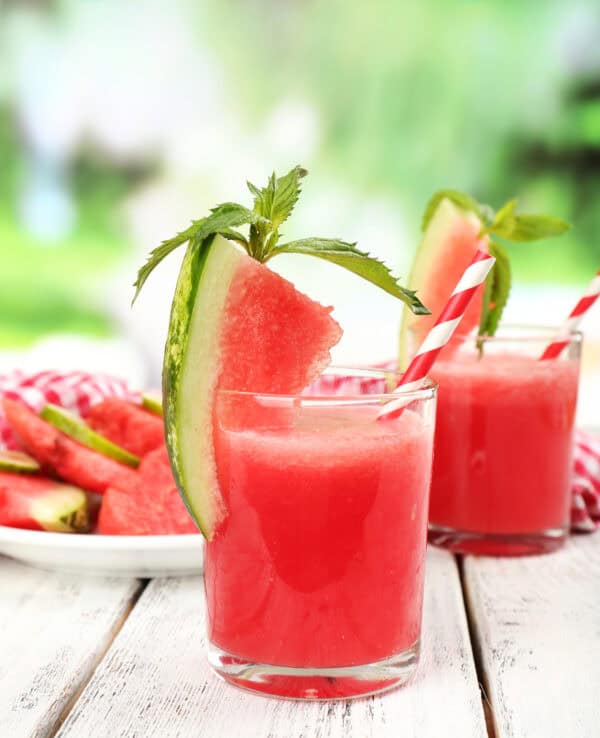 Refreshing watermelon punch in a clear pitcher, inspired by Chloe’s Southern kitchen at Big Mill Bed and Breakfast.
